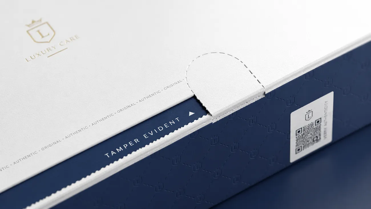 Tamper‑evident tear seal and authenticity QR label on custom luxury paper boxes for anti‑counterfeit protection