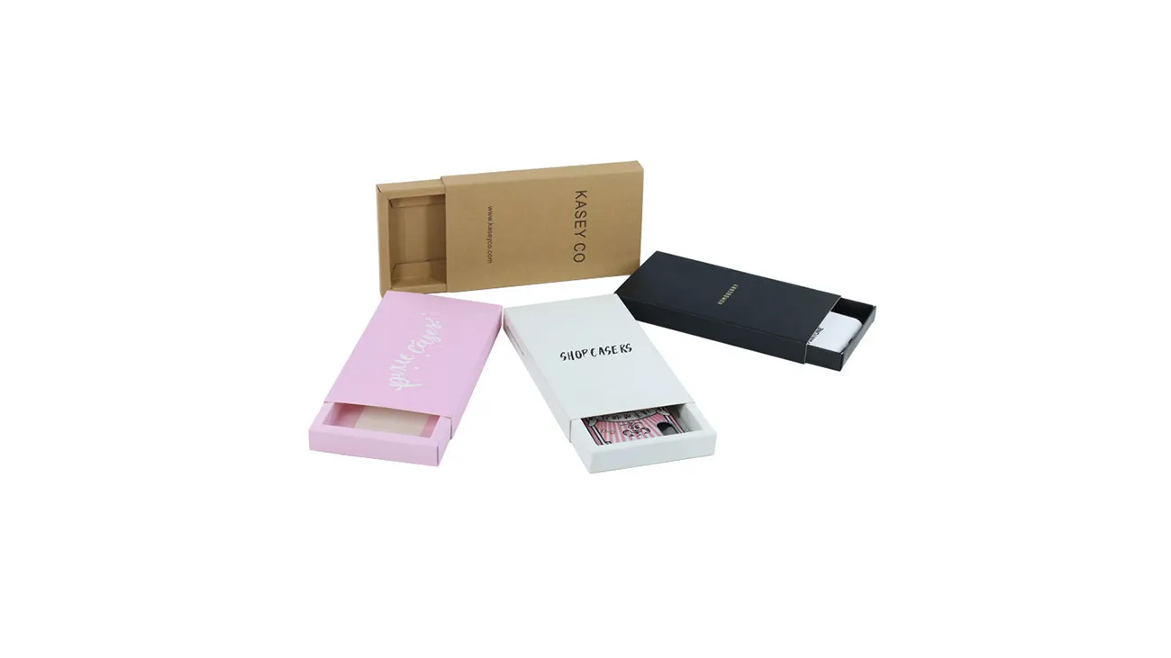 Samples of drawer-style boxes in pink, white, black, and kraft paper colors.