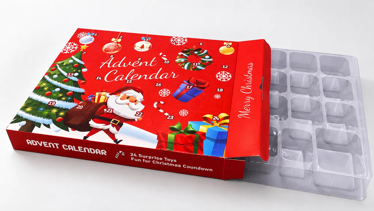 Red 24-day advent calendar box displayed with a clear plastic insert tray.