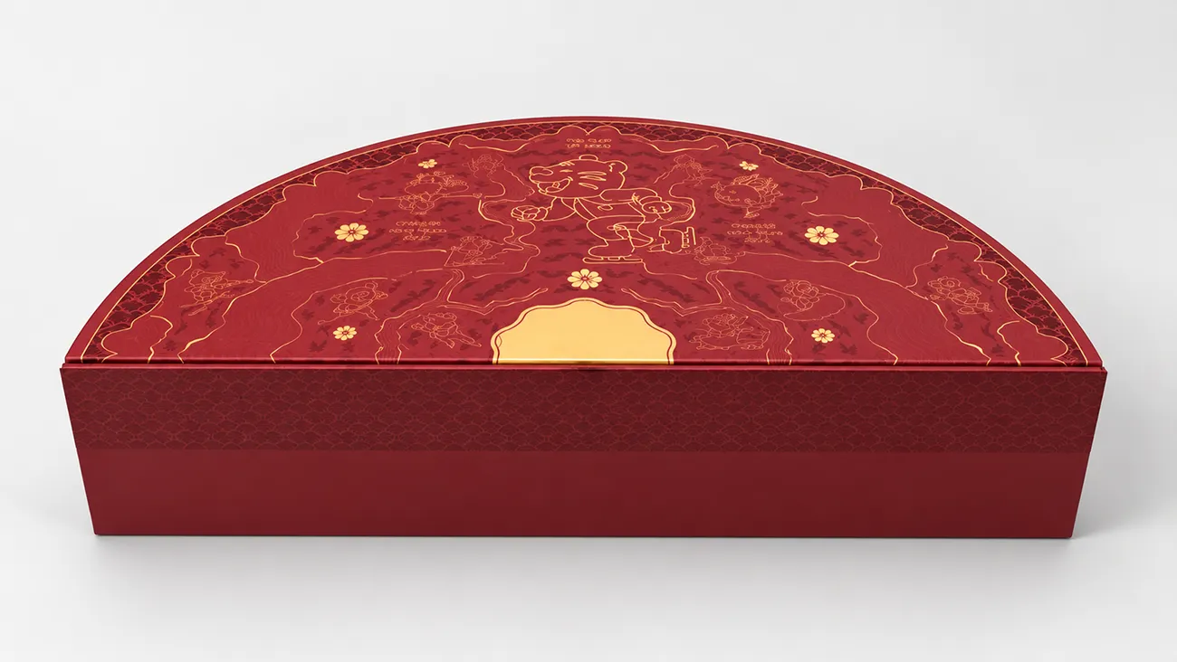Custom shaped paper box beside a standard rectangular box